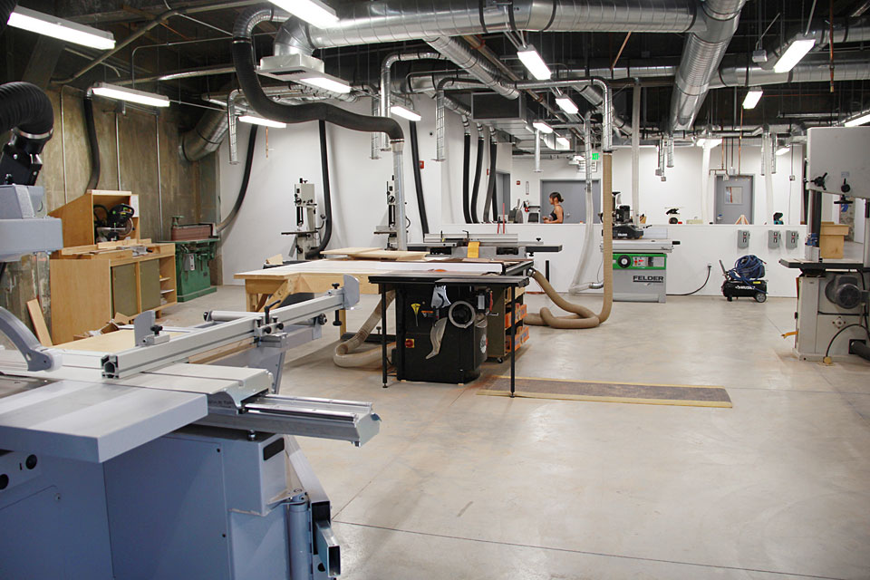 The newly renovated woodshop contains equipment like a Vertical Band Saw, Large Metal Drill Press, Large Wood Drill Press, 12" Sliding Table Saw to name a few.